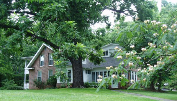 Photo is courtesy of the North Carolina Highway Historical Marker Program. This house is located at Lynn in Polk County.