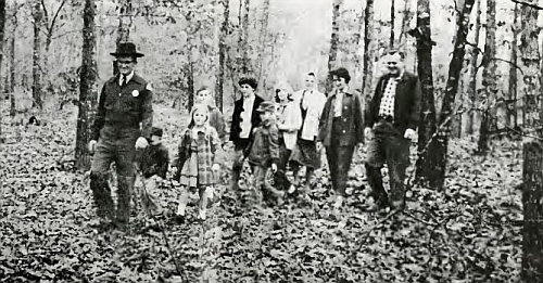 Ranger and hikers, Duke Power State Park, ca. early 1960s. From <i>North Carolina State Parks</i>, brochure 1965, North Carolina Division of Parks and Recreation.