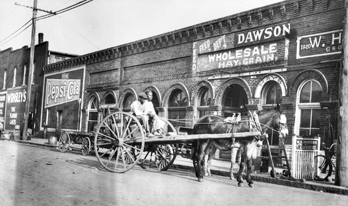 Advertisements painted on the sides of buildings, Kinston, ca. 1922. North Carolina Collection, University of North Carolina at Chapel Hill Library.