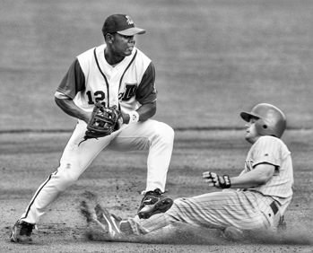 A play from the Durham Bulls-Scranton Barons game at the Durham Bulls Athletic Park, 25 May 2003. Photograph by Sara Davis. Durham Herald-Sun.